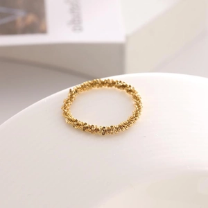 Textured 18K gold plated titanium steel ring with elegant sparkling ripple design