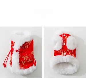 Detail view of red festive pet vest with gold plum prints and Chinese frog buttons