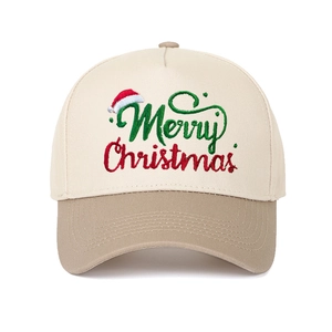 Detailed close-up of Merry Christmas embroidery on a 5-panel cotton baseball cap