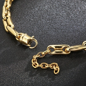 Detailed close-up of the gold lobster clasp and adjustable extension on the coffee bean chain