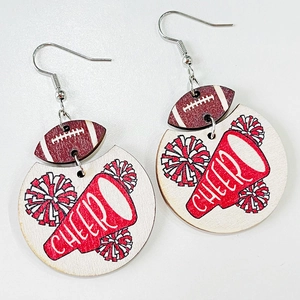 Detail of wooden cheerleading earrings featuring a brown football and red cheer megaphone