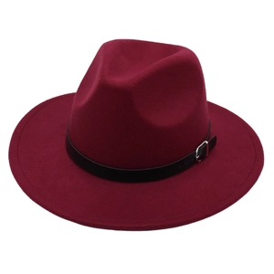 Classic dark wine red fedora wool felt hat with black leather belt buckle on white background