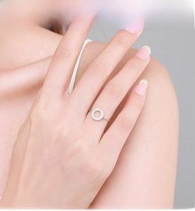 Close-up of S925 sterling silver hollow ring with pavé micro-inlaid crystals on hand