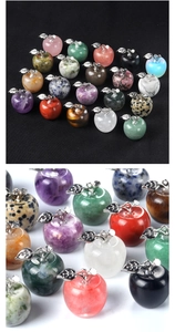 Detailed view of various colorful natural crystal mini apple pendants with metal stems
