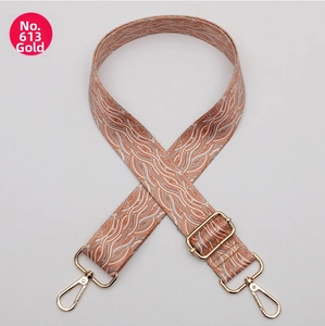 Adjustable woven handbag strap with wave pattern and gold metal spring buckles
