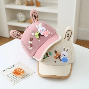 Kids cartoon baseball cap with bunny ears and mushroom patches in pink and beige colors