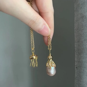 Baroque octopus and jellyfish necklaces with natural pink pearls on gold chains