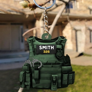 Tactical vest keychain with Smith nameplate and mini handcuffs on a metal ring charm