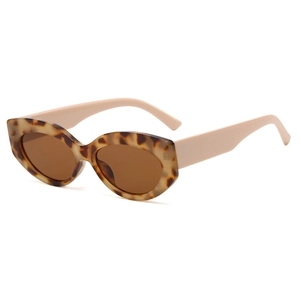 Retro cat-eye tortoise shell sunglasses with beige temples and brown lenses
