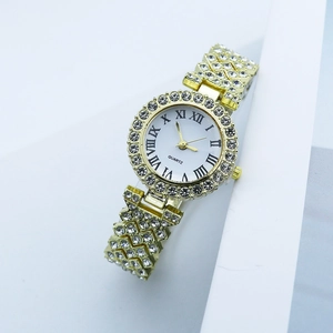 Elegant gold quartz watch for women with sparkling crystal bezel and Roman numeral dial