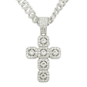 Detailed view of silver Cuban chain necklace with a large iced-out rhinestone cross pendant