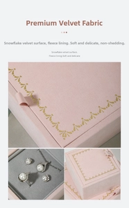 Detail of pink snowflake velvet jewelry box with gold foil edges and gray lining