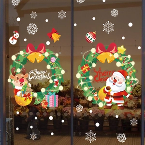 Adesivi natalizi per vetrine con Babbo Natale, renne e fiocchi per decorazione vetro