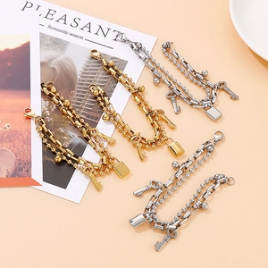 Double-layered stainless steel bead bracelet with padlock and key charms for women