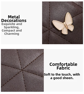 Detail of dark brown quilted leather with butterfly metal hardware and fine stitching