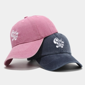 Faded cotton baseball cap with Cool Mom embroidery in pink and charcoal grey colors