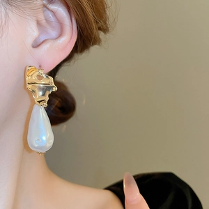 French vintage gold drop earrings with irregular metal texture and white teardrop pearl