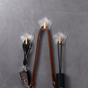 Sternförmiger Wandhaken mit hoher Tragkraft für Schlüssel und Taschen an Steinwand