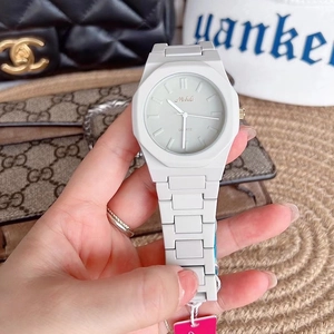 Close-up of white polygonal quartz watch with Mishali logo and matching silicone chain strap