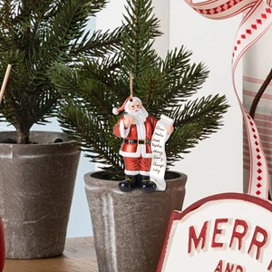 Ornement de Noël représentant un Père Noël lisant avec liste de noms personnalisable