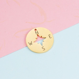 22mm golden stainless steel compass pendant with N E S W engraving on a dual-tone background