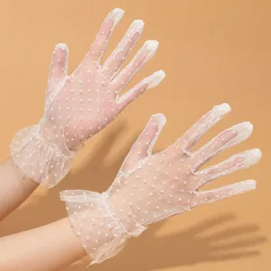 Elegant white polka dot lace gloves with ruffled elastic cuffs for bridal and formal wear