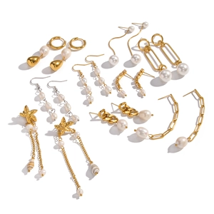 Golden baroque pearl tassel earrings collection featuring elegant shell accents on white background