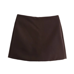 Detail view of smooth dark brown mini skirt with A-line cut and hidden side zipper