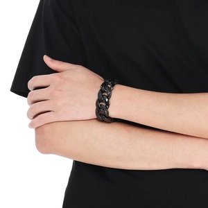 Detail of black pave-set stones on 25mm Cuban chain bracelet for men with street style