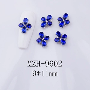 Blue rhinestone flower nail charm with silver base, MZH-9602 model, size 9x11mm