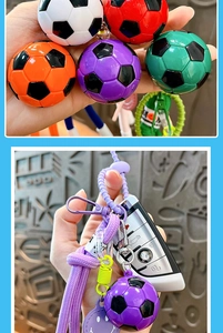 Detail of colorful 3D soccer ball keychains with matching braided ropes and car keys