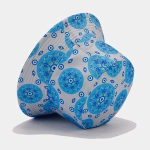 Fashionable grey bucket hat with blue mandala and evil eye print shown from a 45-degree angle