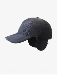 Detail view of winter baseball cap with diamond quilting and fold-down ear protection