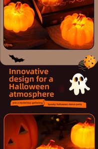 Detail of glowing LED pumpkin lanterns with warm orange light for Halloween table decor