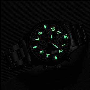Black stainless steel men's chronograph watch with luminous green dial markers and date