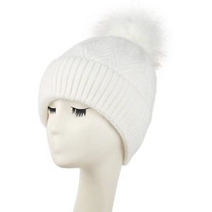 Women's warm white cable knit beanie with fluffy faux fur pom pom for winter outdoor