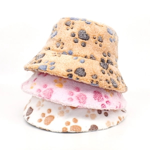 Detailed plush texture of winter bucket hats with cute bear paw prints in various colors