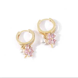 Pink four-leaf flower pearl earrings with golden hoops and crystal pendants
