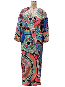 Detail of colorful mandala print and thick wool-blend fabric on women's long open coat
