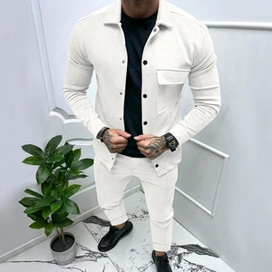 Detail of white ribbed texture fabric on men's casual jacket and matching trousers set