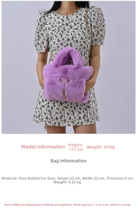Detail of purple faux rabbit fur handbag with gold deer head hardware and tassel charm