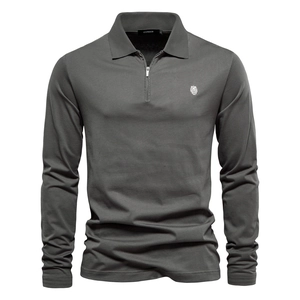Men's dark grey slim fit polo shirt with half-zip collar and lion embroidery on white background
