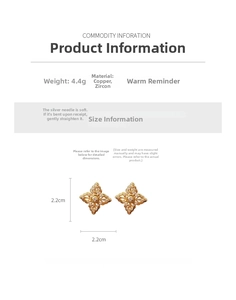 Detail of flower earrings with gold plating, cubic zirconia, and silver needle posts