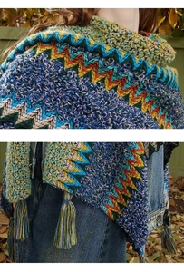 Detailed macro view of the knitted shawl featuring colorful wave patterns and fringe tassels