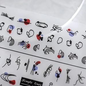 Self-adhesive nail art stickers featuring minimalist black lines and 3D embossed abstract art