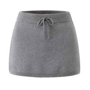 Detail of grey high-waisted knitted mini skirt with adjustable drawstring waistband