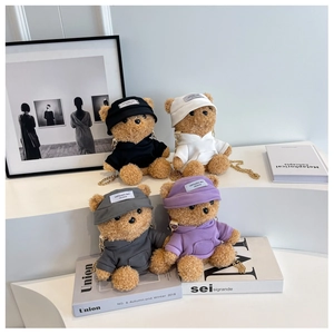 Detailed group shot of cute plush bear crossbody bags with metal chains in four colors