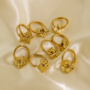 Elegant 18K gold stainless steel hoop earrings with heart and star charms on satin