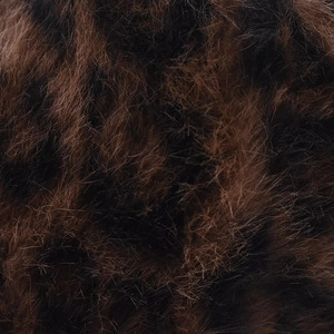 Macro shot of faux fox fur baseball cap showing soft leopard print plush texture