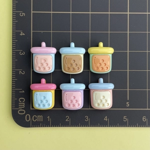 Miniature colorful resin milk tea cup charms with scale ruler for size reference